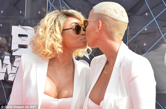 Putting on a show Amber Rose right and Blac Chyna left kissed on the carpet as they attended the 2015 BET Awards at the Microsoft Theater in Los Angeles California on Sunday