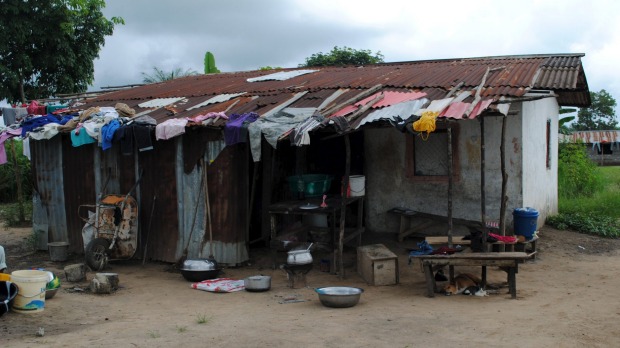 A quarantined home is seen in Nedowein Liberia on Wednesday