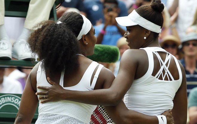 Serena Williams hugs her sister Venus after Serena’s 6-4 6-3 victory