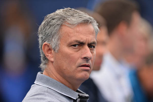 AFP  GETTY    
     BUYING SUCCESS Jose Mourinho has taken a swipe at Chelsea's title rivals