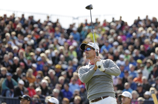 Adam Scott is in contention after shrugging off the weather delay to shoot par 67