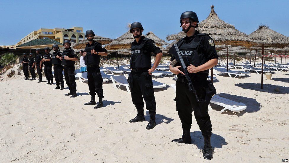 Tunisian security forces on the beach at Sousse one week after deadly attack