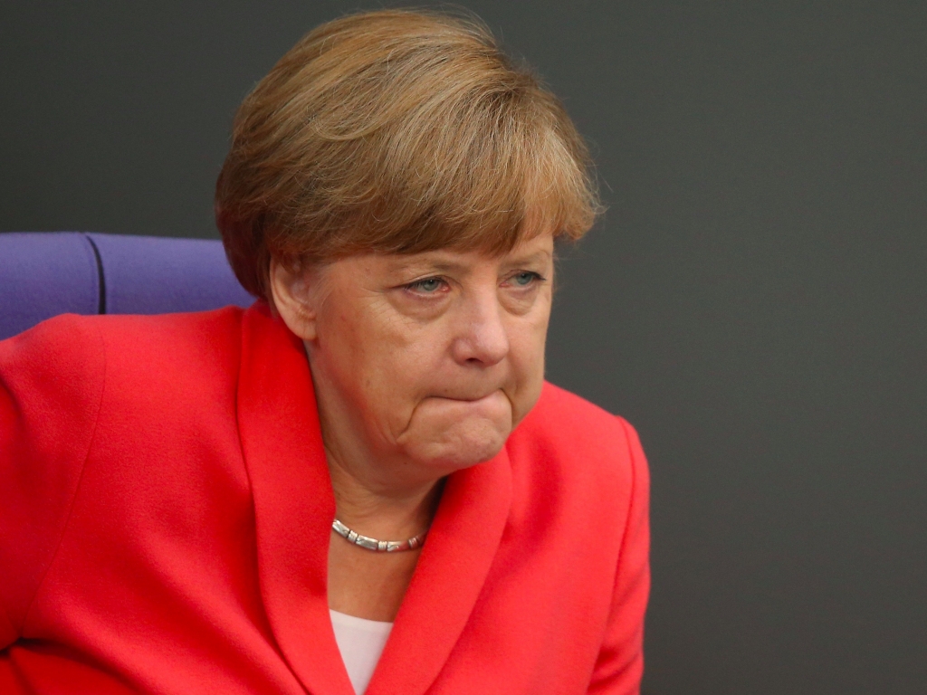 German Chancellor Angela Merkel attends debates prior to a vote over the third EU financial aid package to Greece at an extraordinary session of the German parliament the Bundestag