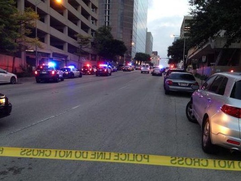 Austin Police have shot and killed a man with a rifle at a posh downtown hotel who they say fatally shot another person in the lobby