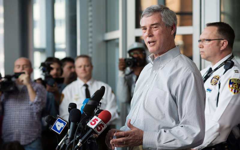 St. Louis County District Attorney Robert Mc Culloch speaks at a press conference about an arrest in connection with the shooting at the Ferguson Police Department last Thursday night that left two police officers wounded in Clayton Missouri