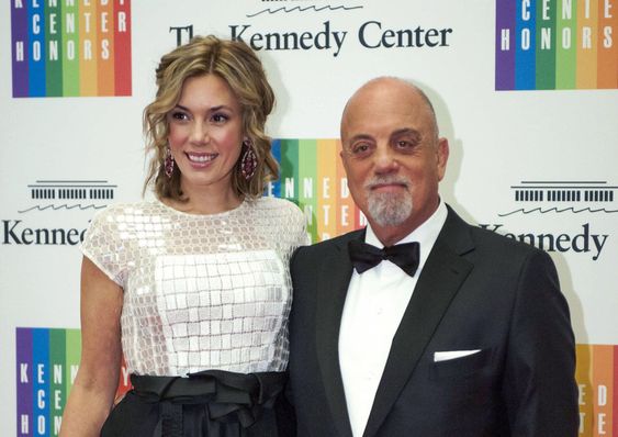 Kennedy Center Honoree Billy Joel,right and Alexis Roderick arrive at the Kennedy Center Honors gala dinner in Washington. Joel married girlfriend Alexis Roderick in a surprise ceremony at the couple