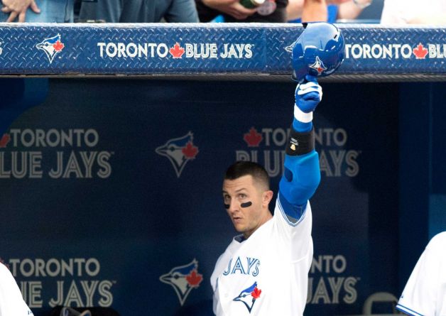 Toronto Blue Jays Troy Tulowitzki tips his helmet after hitting a two-run home run during the third inning of a baseball game against the Philadelphia Phillies Wednesday