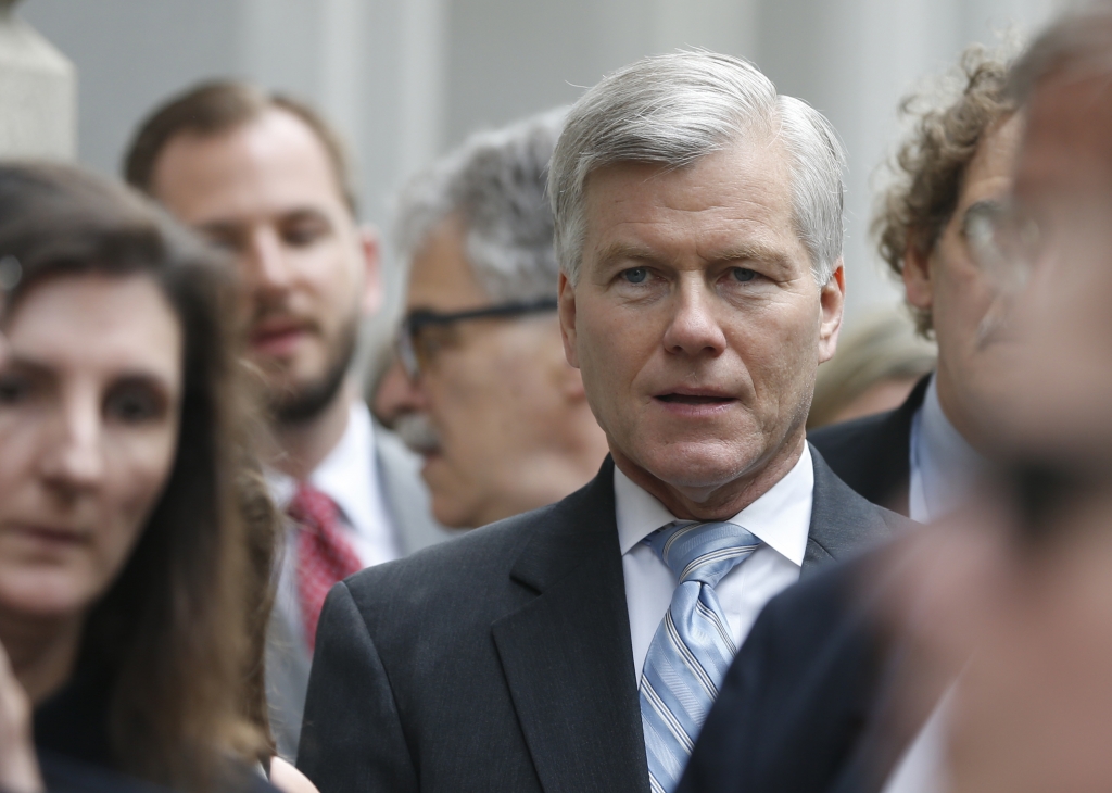 Former Virginia Gov. Bob Mc Donnell waits in line as he arrives at the 4th Circuit Court of Appeals for a hearing on the appeal of his corruption conviction in Richmond Va. Tuesday