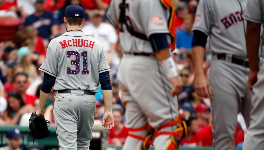 Houston Astros Collin Mc Hugh leaves the baseball game during the sixth inning against the Boston Red Sox in Boston Saturday