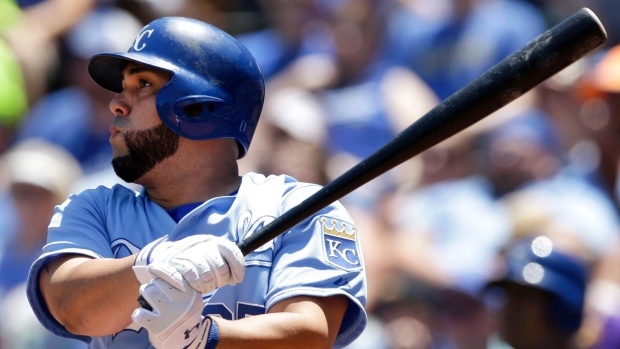 Kansas City Royals designated hitter Kendrys Morales hits a three-run home run off Toronto Blue Jays starting pitcher Felix Doubront during the first inning