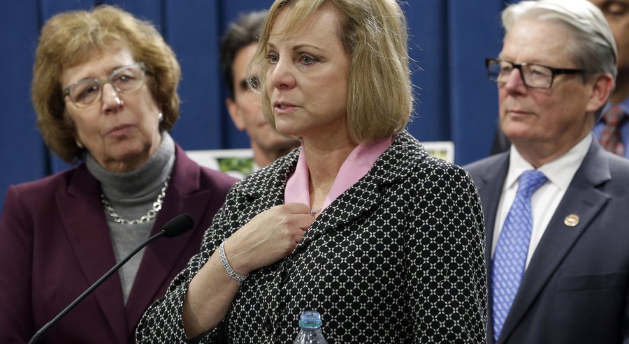 Debbie Ziegler center the mother of Brittany Maynard speaks in support of proposed legislation allowing doctors to prescribe life-ending medication to terminally ill patients during a news conference