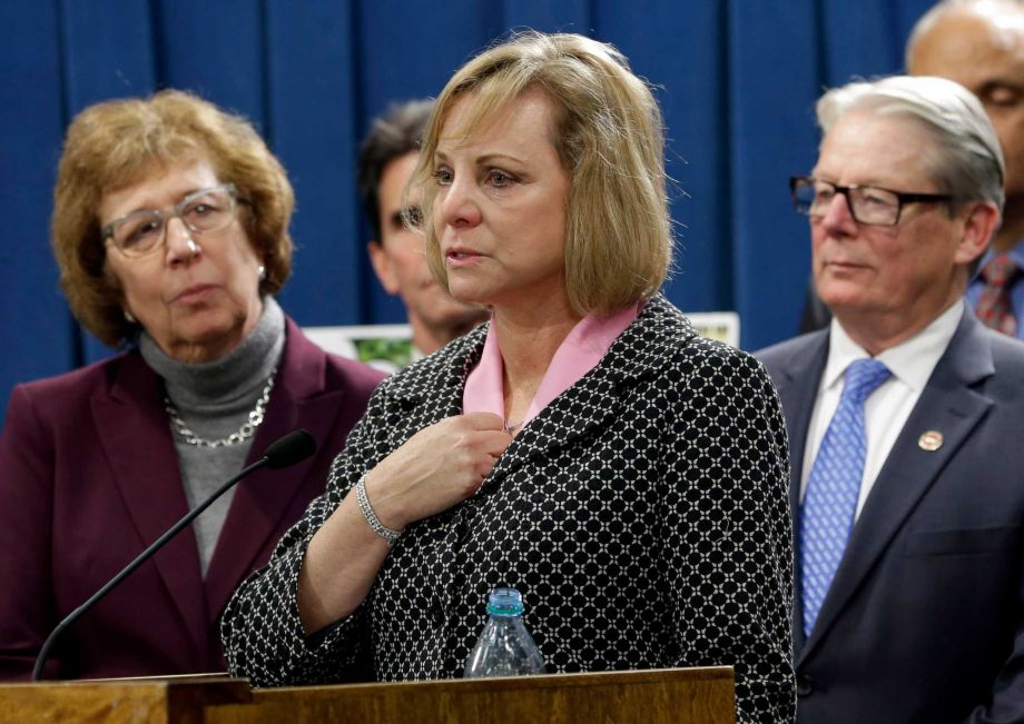 Debbie Ziegler center the mother of Brittany Maynard speaks in support of proposed legislation allowing doctors to prescribe life-ending medication to terminally ill patients during a news conference