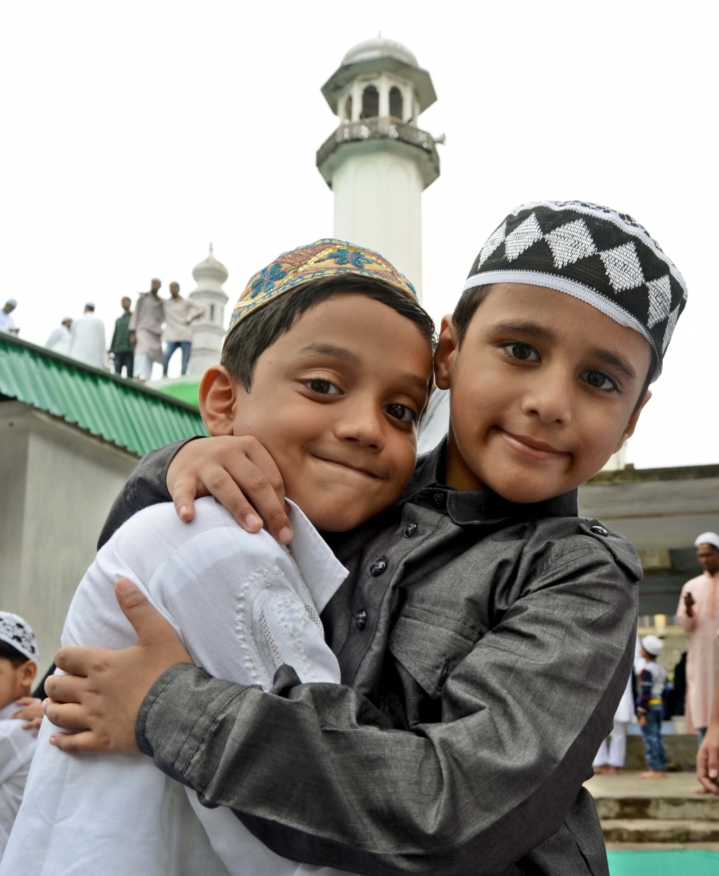 Children exchange Eid greetings after offering namaz outside a mosque in Bhubaneswar on Saturday | EXPRESS