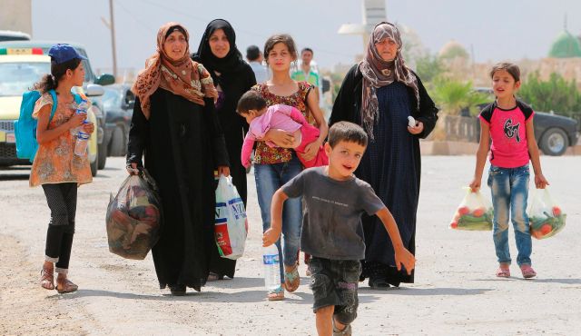 Civilians who fled the violence in Hasaka city Syria