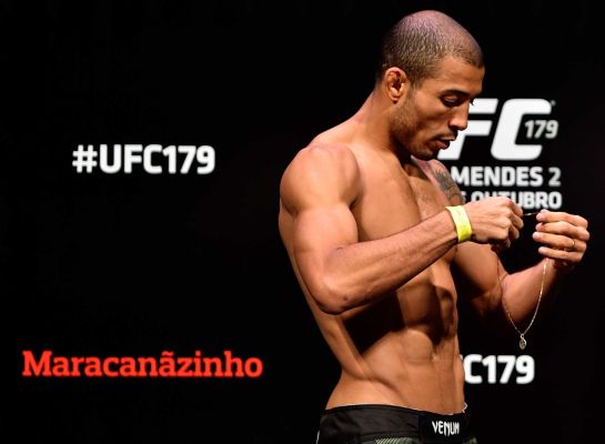 Jose Aldo prepares to weigh in during the