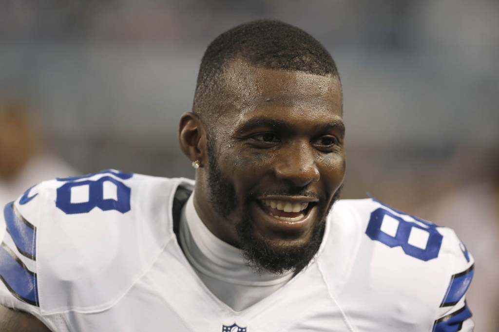 Dallas Cowboys wide receiver Dez Bryant talks to his teammates on the sideline during the first half of an NFL wildcard playoff football game against the Detroit Lions in Arlington Texas. Dez Bryant sounds