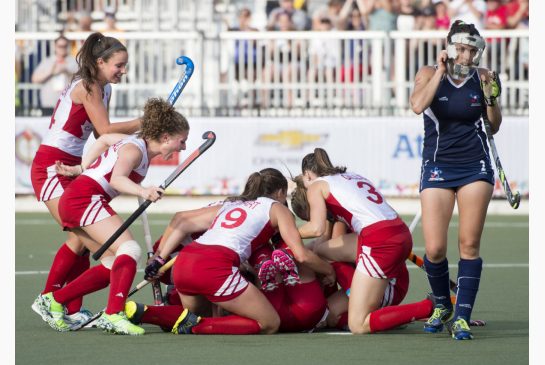 Members of Canada's women's field hockey team celebrate Brienne Stairs goal against Chile