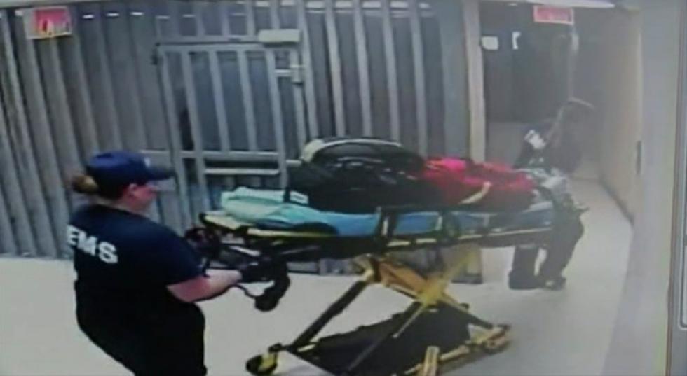 Associated Press In this frame taken from video July 13 provided by the Waller County Sheriff’s Department from a motion-operated camera emergency personnel carry a gurney near Sandra Bland’s jail cell at the Waller County jail in Hempstead Texa