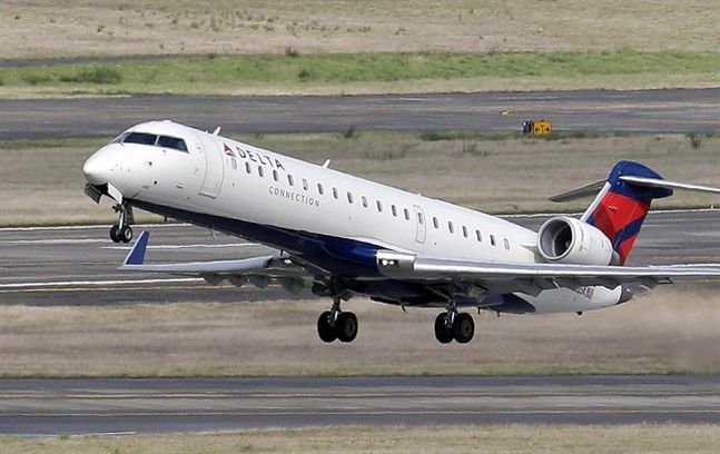 24 2015 a Delta jet takes off from Seattle Tacoma International Airport in SeaTac Wash. Delta Air Lines reports quarterly financial results on Wednesday