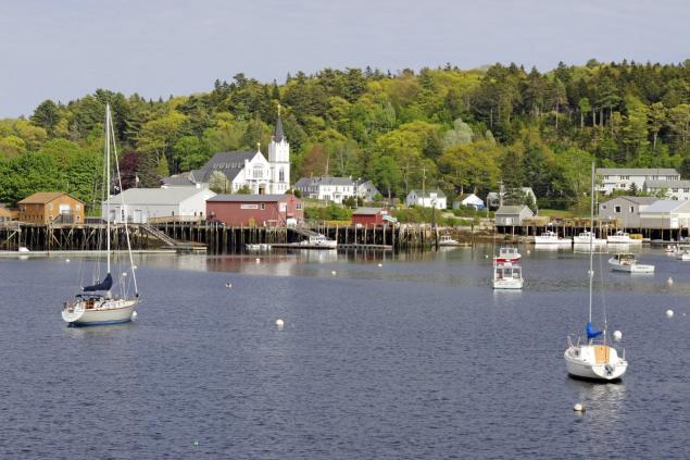 Three bodies were disvcovered in the seaside enclave of Boothbay Harbor in Maine police said