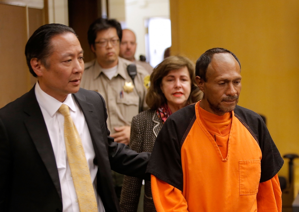 Francisco Sanchez enters court for an arraignment with San Francisco public defender Jeff Adachi