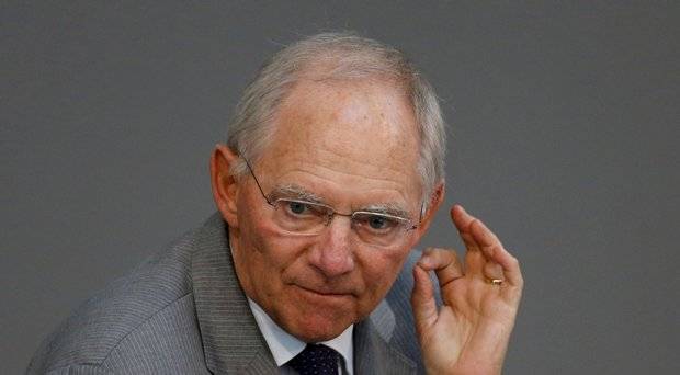 German Finance Minister Wolfgang Schaeuble gestures during a parliamentary debate on the Greek debt crisis at the German lower house of parliament Bundestag in Berlin Germany