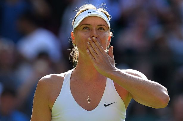 Russia's Maria Sharapova reacts after winning her women's singles first round match