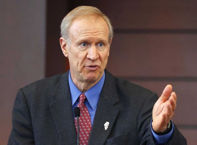 Illinois Gov. Bruce Rauner speaks at a news conference in Chicago. Rauner signed legislation Wednesday June 24 to increase state funding for education ensuring schools remain open even if a dispute between the