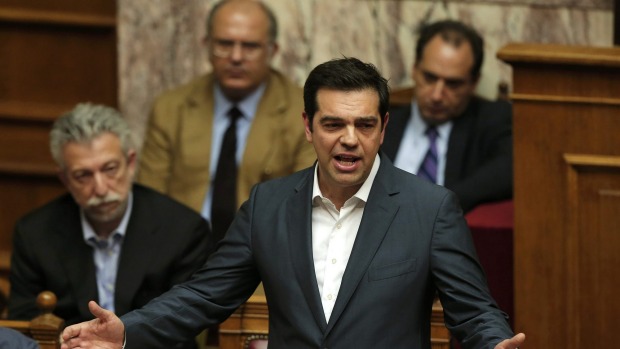 Greek Prime Minister Alexis Tsipras votes at a polling station in Athens on Sunday