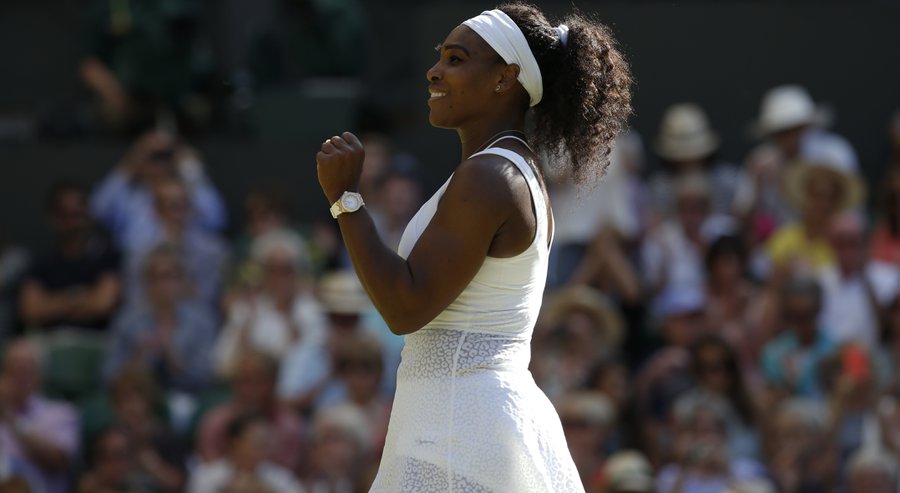 Serena Williams of the United States celebrates as she defeats Maria Sharapova of Russia in their women's singles semifinal match at the All England Lawn Tennis Championships in Wimbledon London Thursday