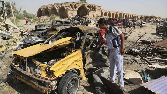 A suicide car bombing in Iraq's eastern Diyala province killed at least 80 people gathered at a marketplace to mark the end of the holy month of Ramadan on Friday