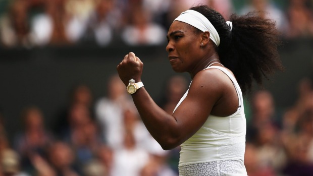 Serena Williams celebrates winning a point against Victoria Azarenka in their Wimbledon quarterfinal match