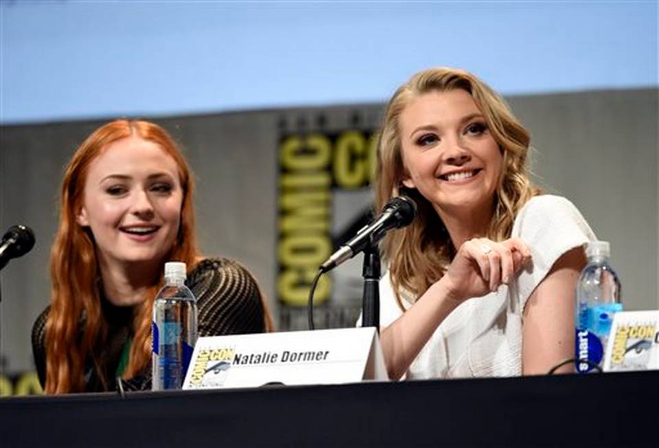 Sophie Turner left and Natalie Dormer attend the'Game of Thrones panel on day 2 of Comic Con International on Friday