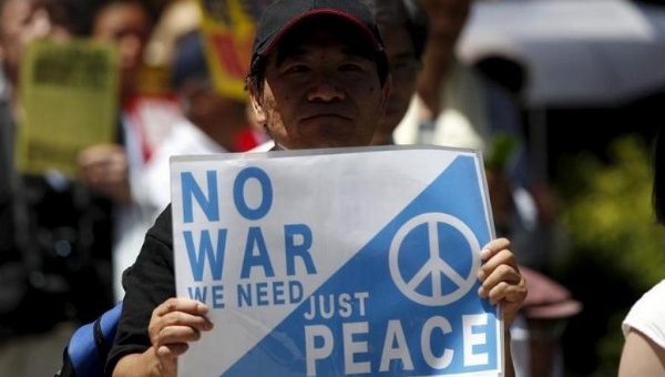 A participant in the rally against Japan