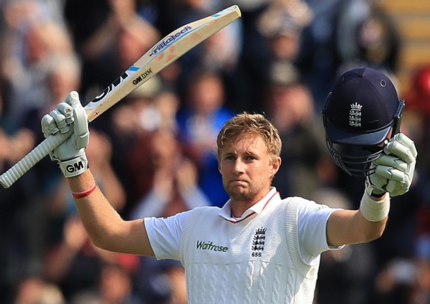 Joe Root celebrates reaching his century against Australia during the first Test in Cardiff