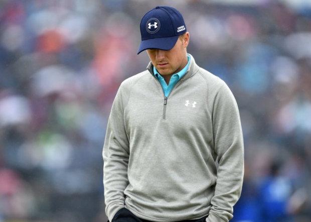 Jordan Spieth in reflective mood on the third tee yesterday as he scraps to stay in contention for the Open title