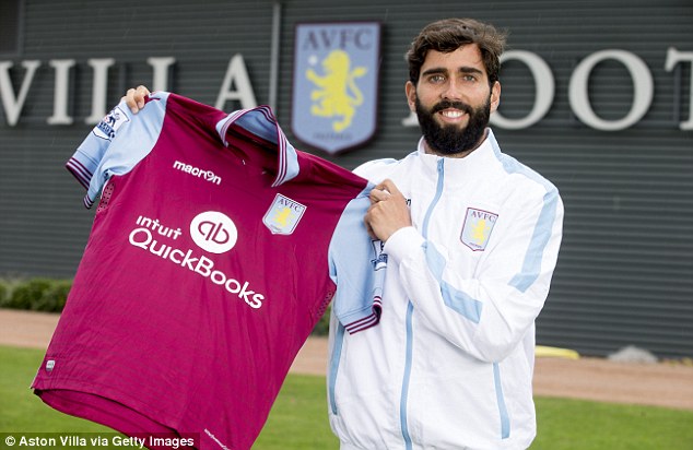 Jose Angel Crespo poses with the shirt after becoming Aston Villa's seventh signing of the summer