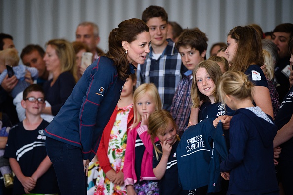 Catherine the Duchess of Cambridge meets children at the British Land Rover BAR America's cup team centre in Portsmouth England on 26 July 2015. AFP