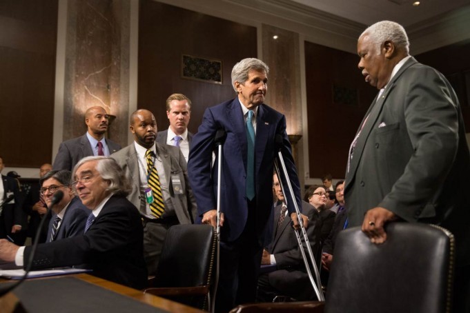 Secretary of State John Kerry center Secretary of Energy Ernest Moniz seated second from left and Secretary of Treasury Jack Lew seated left arrive to testify at a Senate Foreign Relations Committee hearing on Capitol Hill in Washington