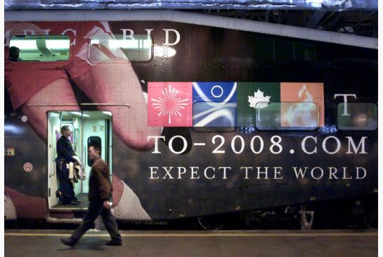 Commuter train adorned with slogan for Toronto's bid for the 2008 Olympics at Union Station in Toronto in 2001