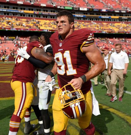 Washington Redskins outside linebacker Ryan Kerrigan runs off the field after an NFL football game against the Jacksonville Jaguars in Landover Md. The Redskins agreed to a multiyear contract extension with