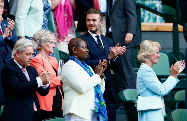 LONDON ENGLAND- JULY 09 David Beckham and Mother Sandra Georgina West applaud after the victory by Jamie Murray of Great Britain and John Peers of Australia in the Gentlemens Doubles Semi Final match against Jonathan Erlich of Israel and Philipp Petz