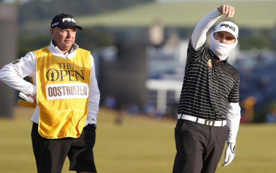 Louis Oosthuizen tests the wind at St. Andrews