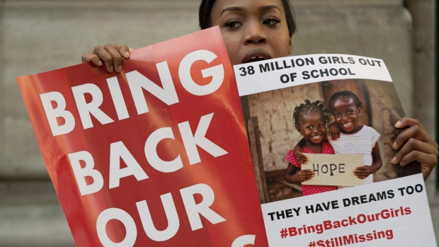 Protesters outside Nigeria House in London demonstrate over the girls&#39 abduction by Boko Haram