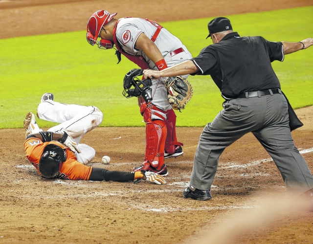 Marlins lose Gordon to thumb injury in 14-3 win over Reds | The Sun News The 