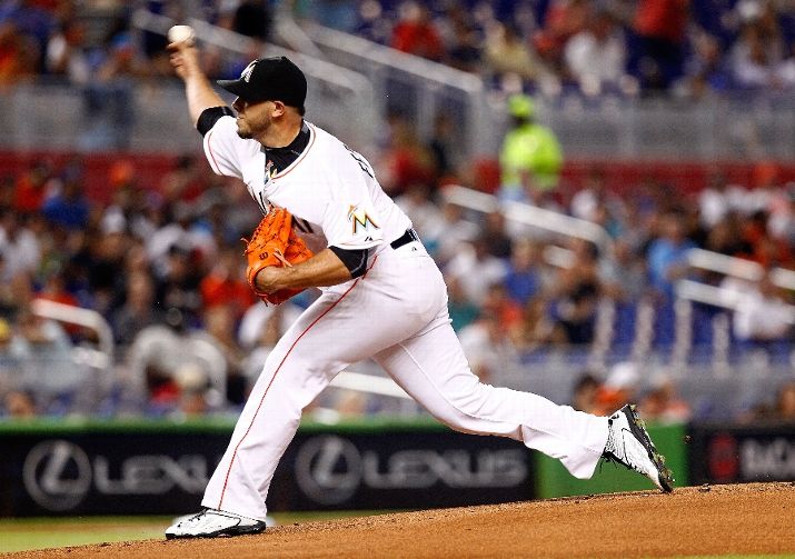 MIAMI FL- JULY 28 Jose Fernandez #16 of the Miami Marlins pitches during a game against the Washington Nationals at Marlins Park