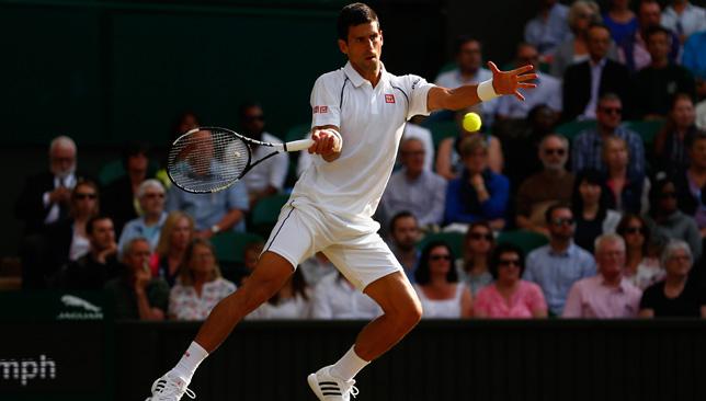 Novak Djokovic plays a forehand during his quarter-final against Marin Cilic