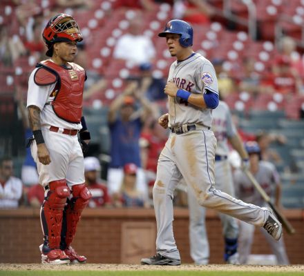 The Mets Wilmer Flores right scores past St