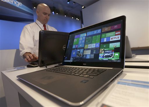 Dell laptop computer running Windows 10 is on display at the Microsoft Build conference in San Francisco. Microsofts new Windows 10 operating system debuts Wednesday