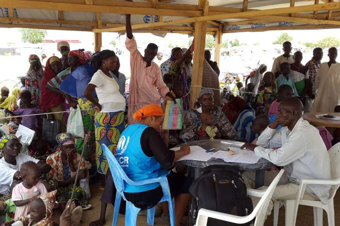 Newly-arrived Nigerian refugees register with UNHCR officials at Minawao Camp northern Cameroon